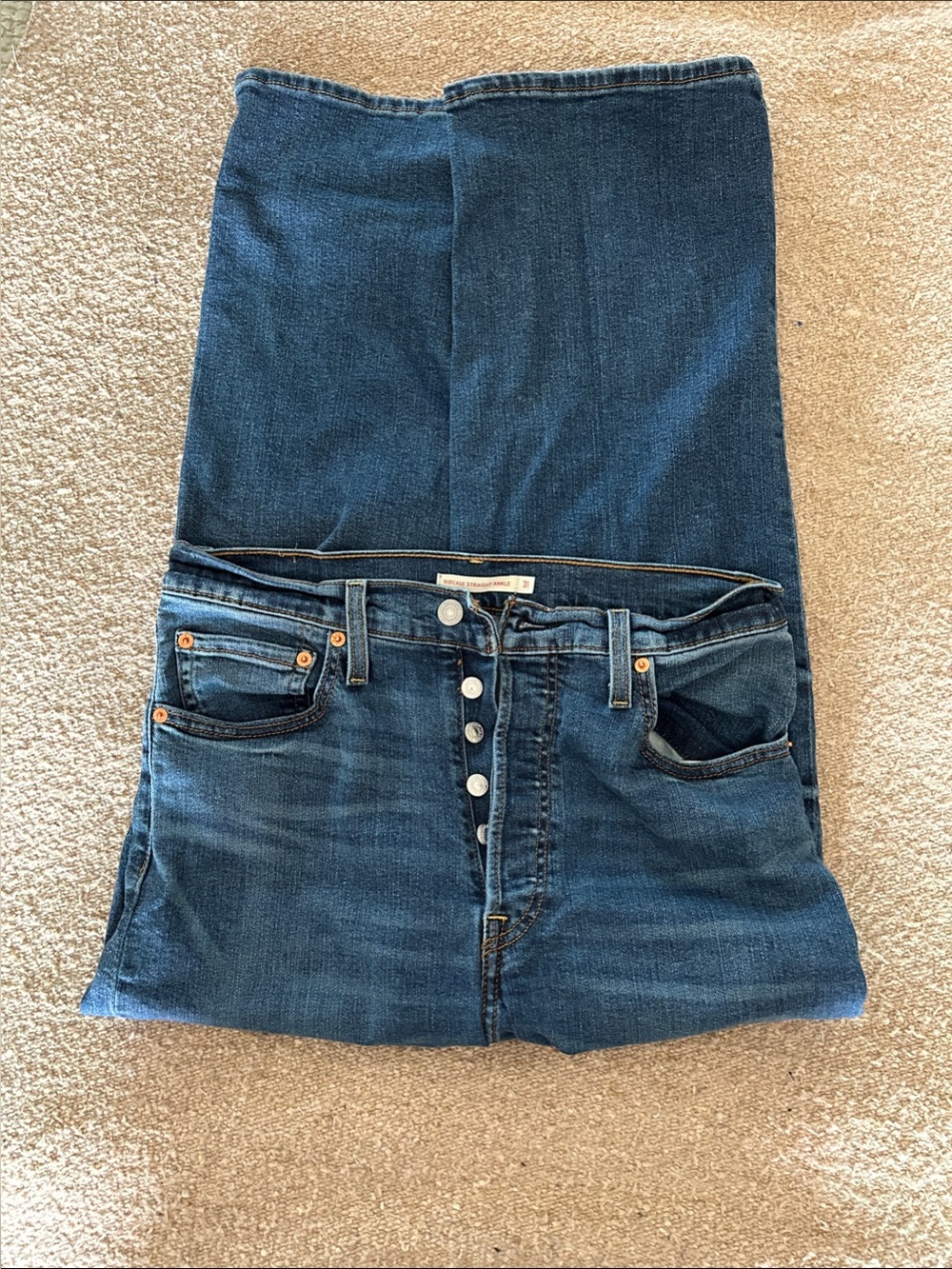 Levi's High-Rise Button-Fly Jeans in Dark Blue Denim